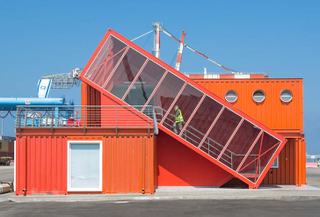 Illustration for article titled Shipping Container Offices Are Right at Home On an Industrial Seafront
